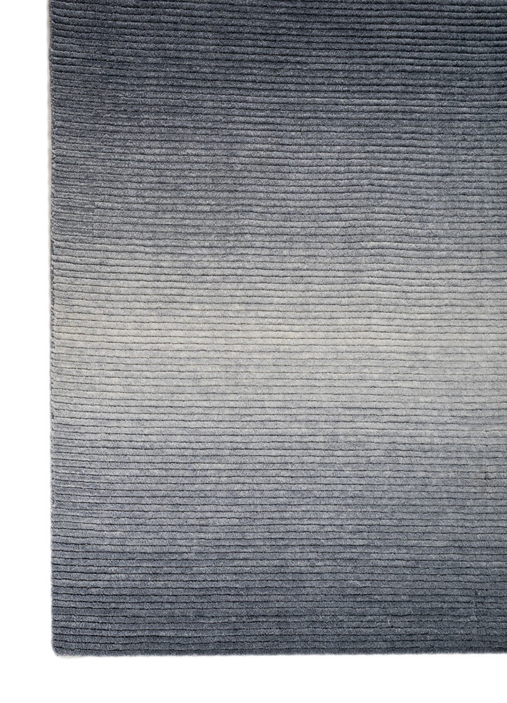 contour blue wool hand loom Rug - Corner