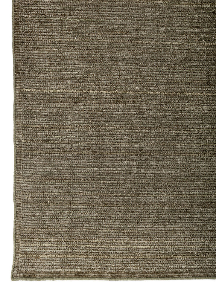 basis green wool hand loom Rug - Corner