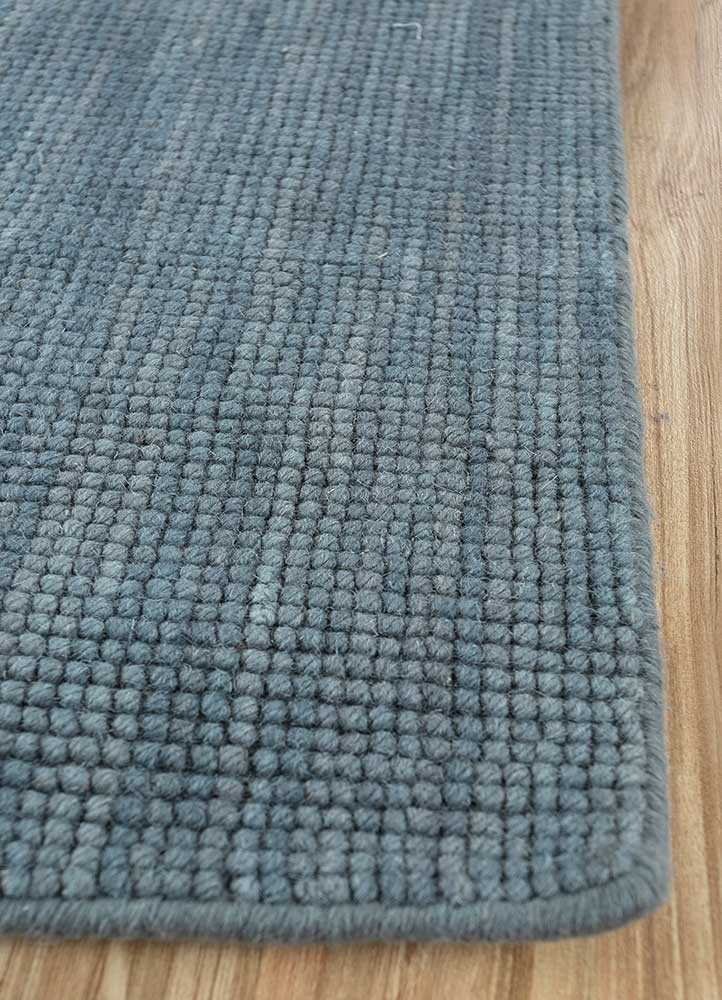 contour blue wool hand loom Rug - Corner