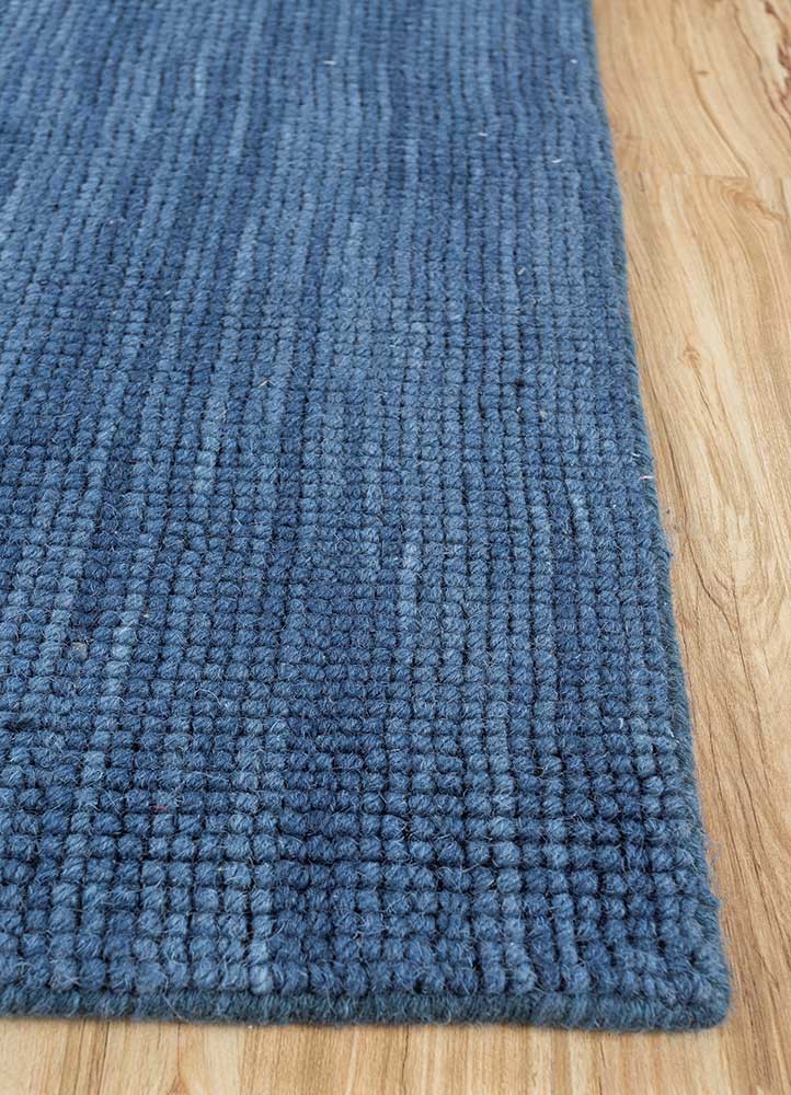 contour blue wool hand loom Rug - Corner