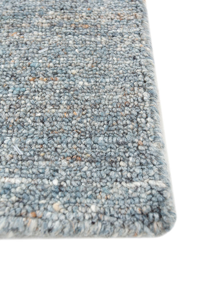 saga blue wool and viscose hand loom Rug - Corner