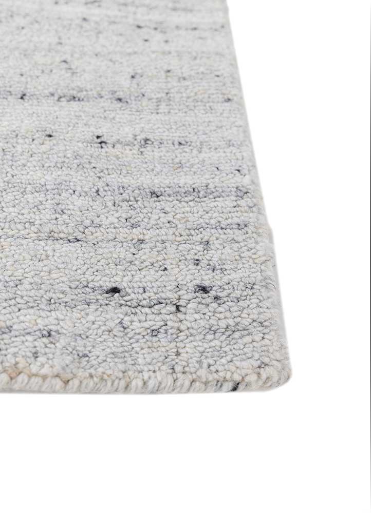 saga ivory wool and viscose hand loom Rug - Corner