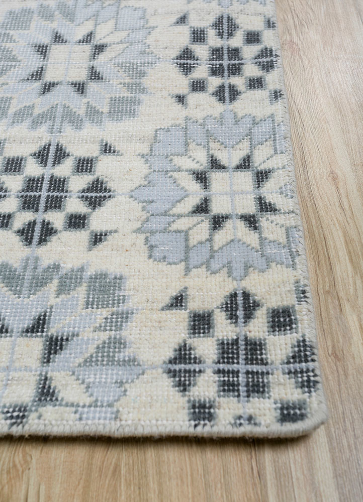 erbe ivory wool hand knotted Rug - Corner erbe ivory wool hand knotted Rug - Corner