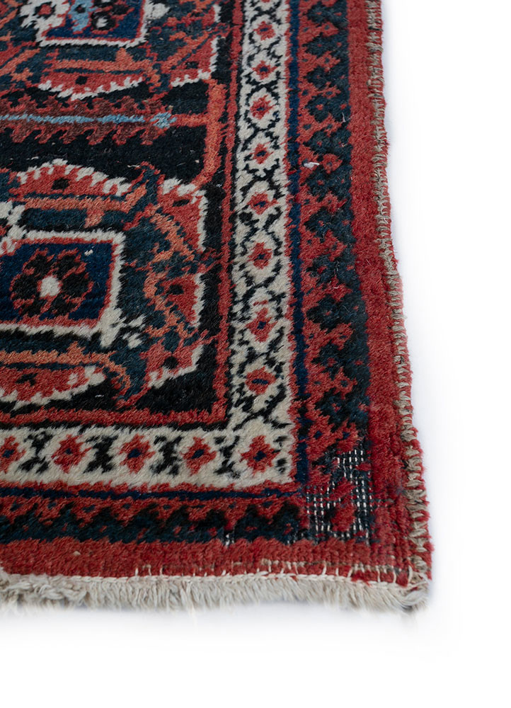 aalam red and orange wool hand knotted Rug - Corner