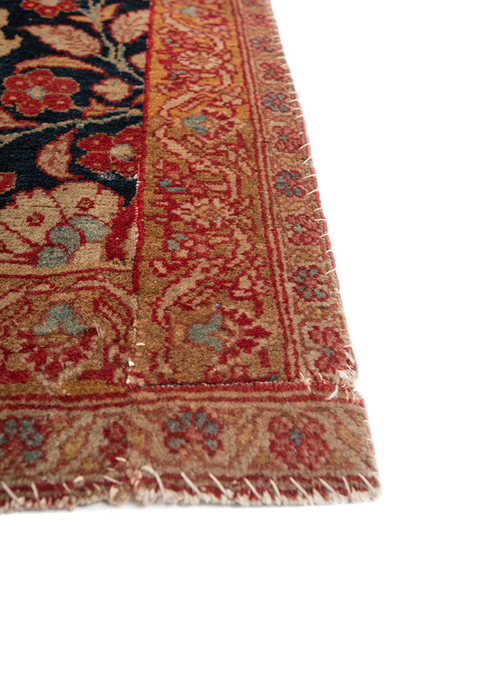 aalam red and orange wool hand knotted Rug - Corner