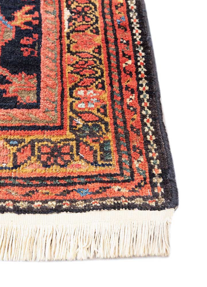 aalam red and orange wool hand knotted Rug - Corner