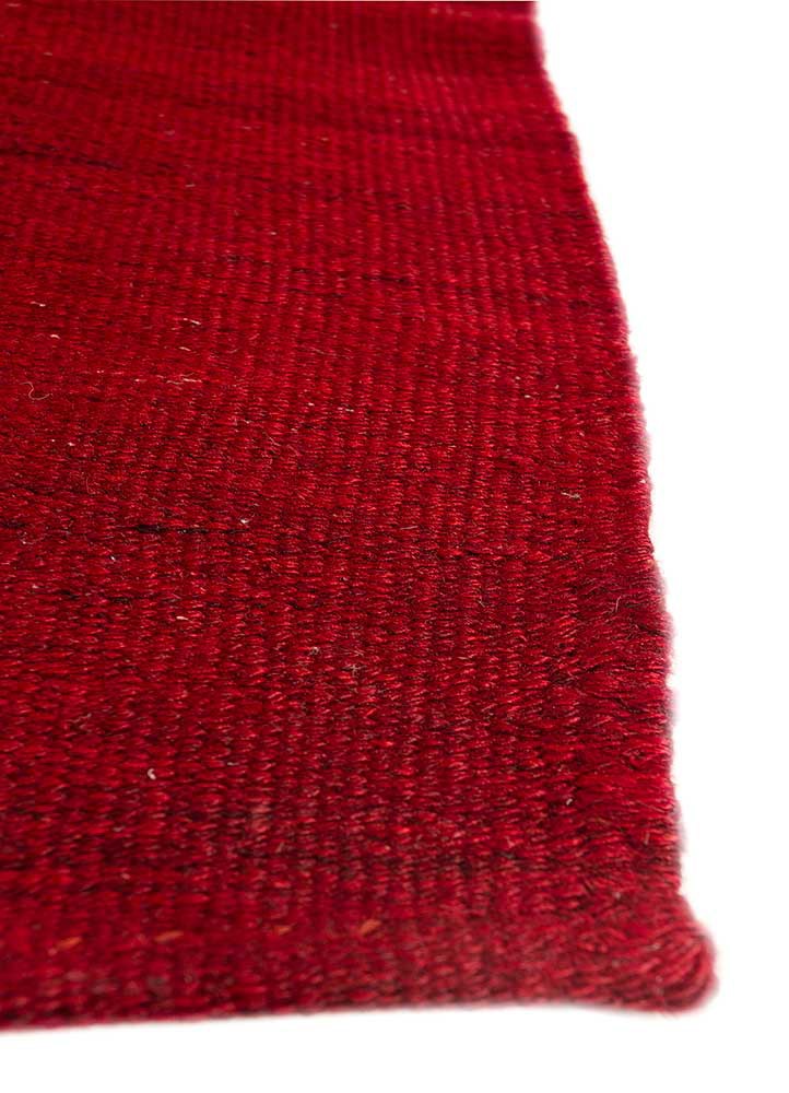 nayaab red and orange wool flat weaves Rug - Corner