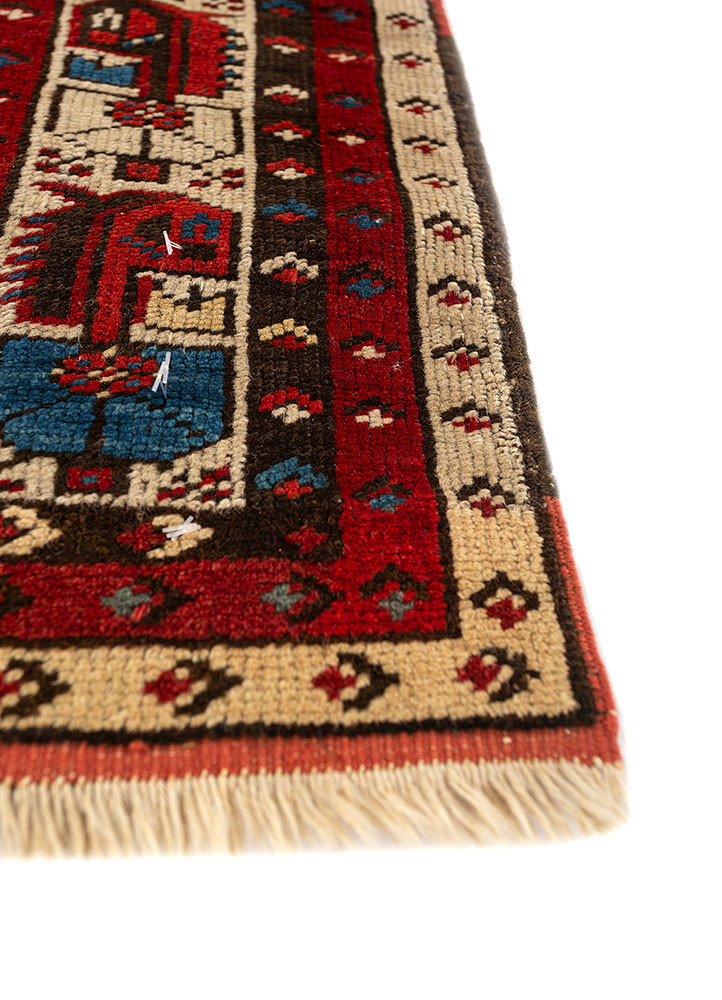 aalam red and orange wool hand knotted Rug - Corner