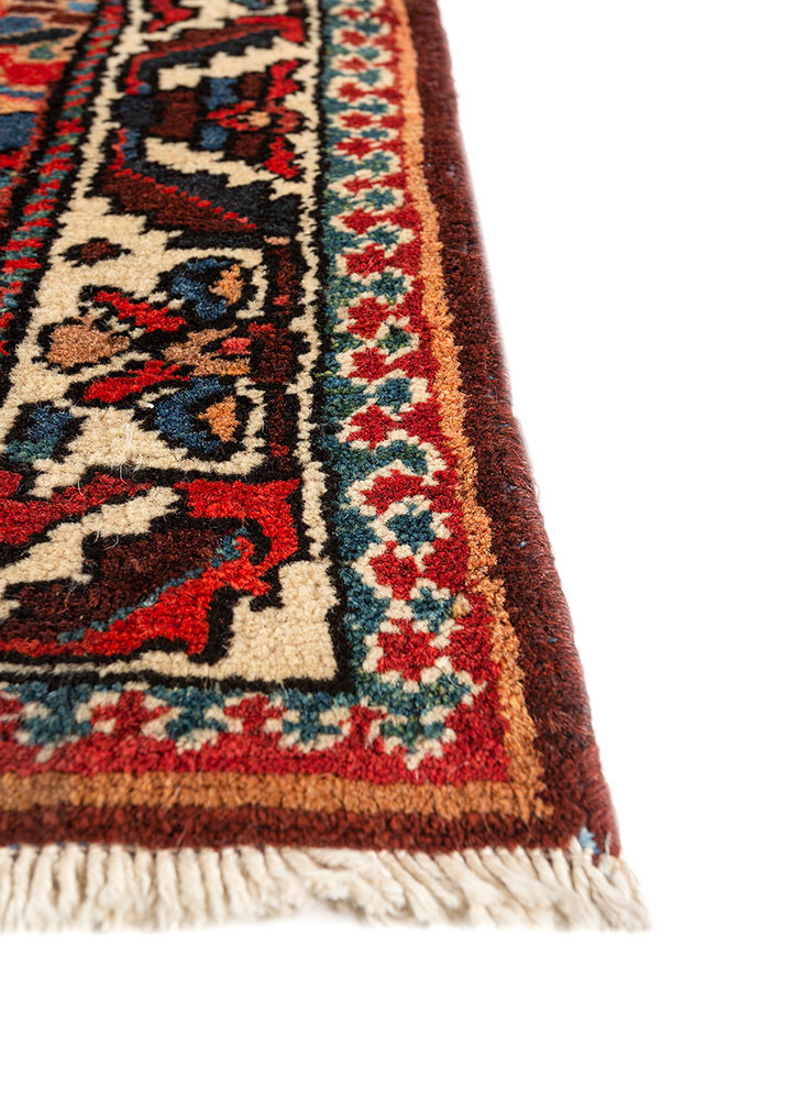 aalam red and orange wool hand knotted Rug - Corner