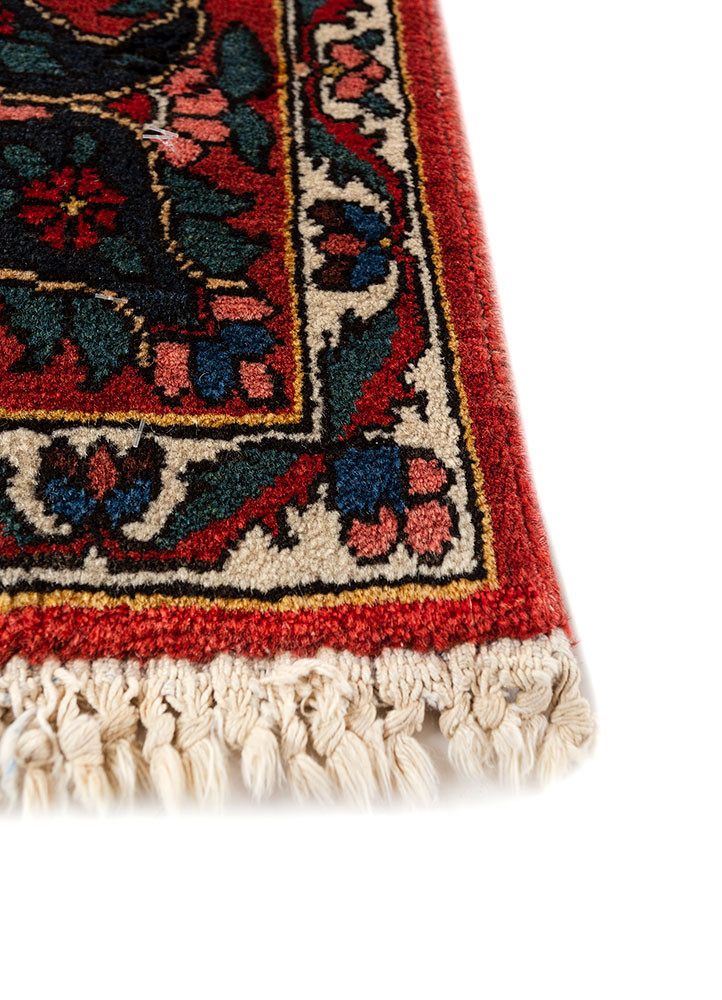 aalam red and orange wool hand knotted Rug - Corner