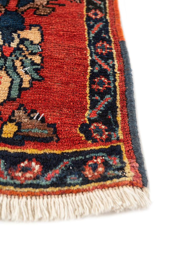 aalam red and orange wool hand knotted Rug - Corner