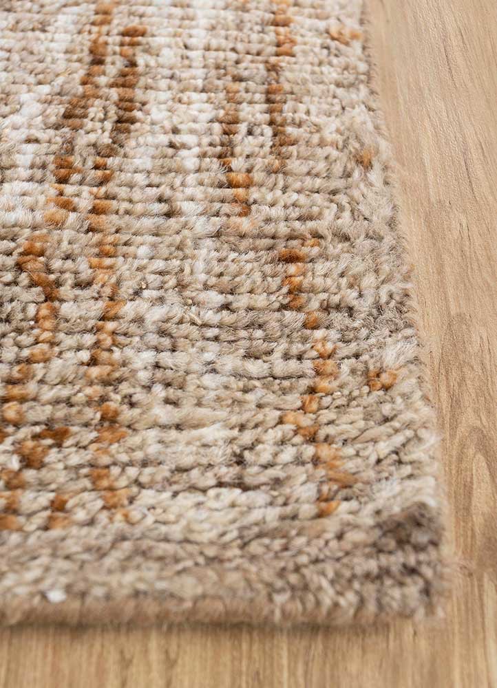 manifest beige and brown afghan wool hand knotted Rug - Corner