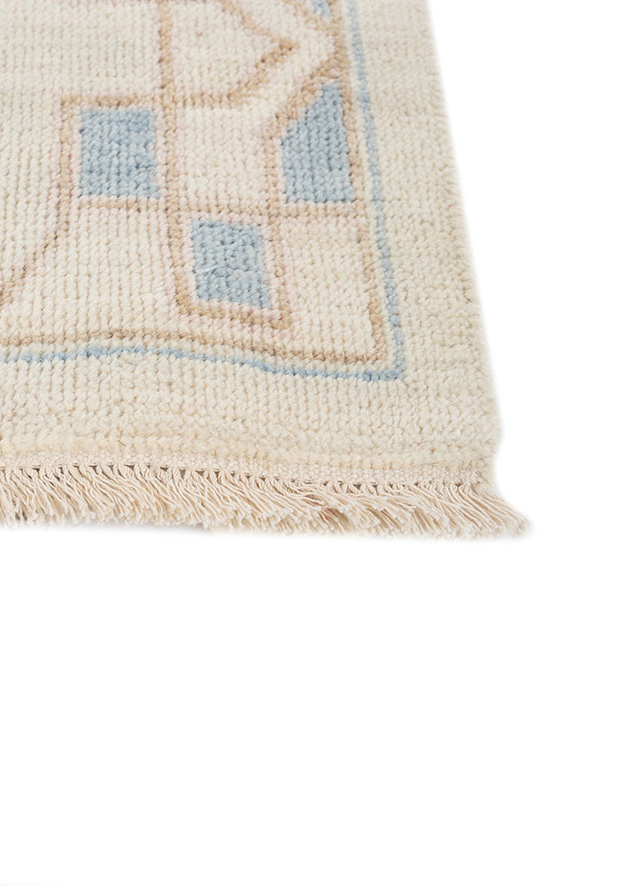 erbe ivory wool hand knotted Rug - Corner erbe ivory wool hand knotted Rug - Corner