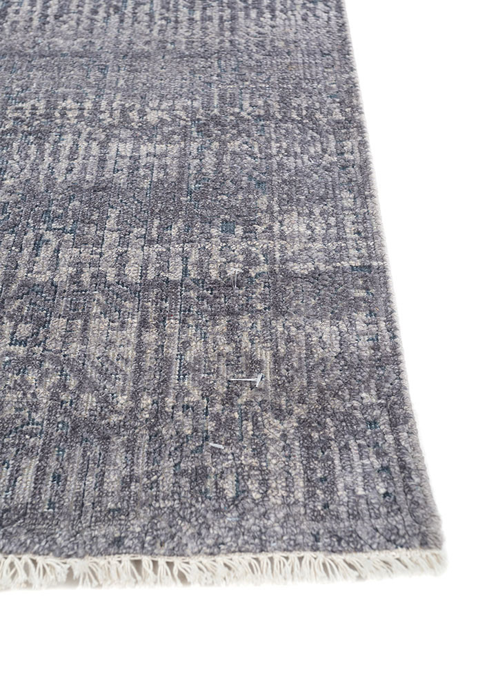 entropy blue wool and silk hand knotted Rug - Corner