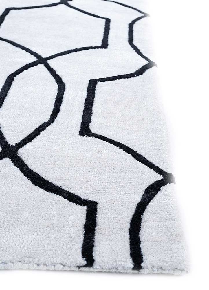 contour ivory wool and viscose hand tufted Rug - Corner