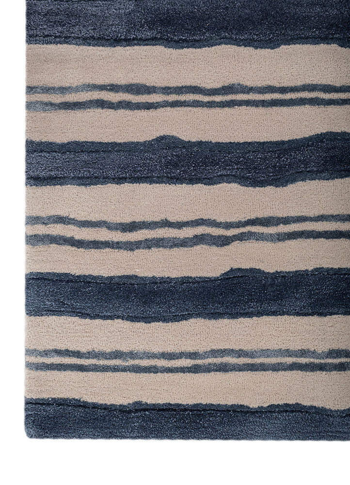 linear blue wool and viscose hand tufted Rug - Corner