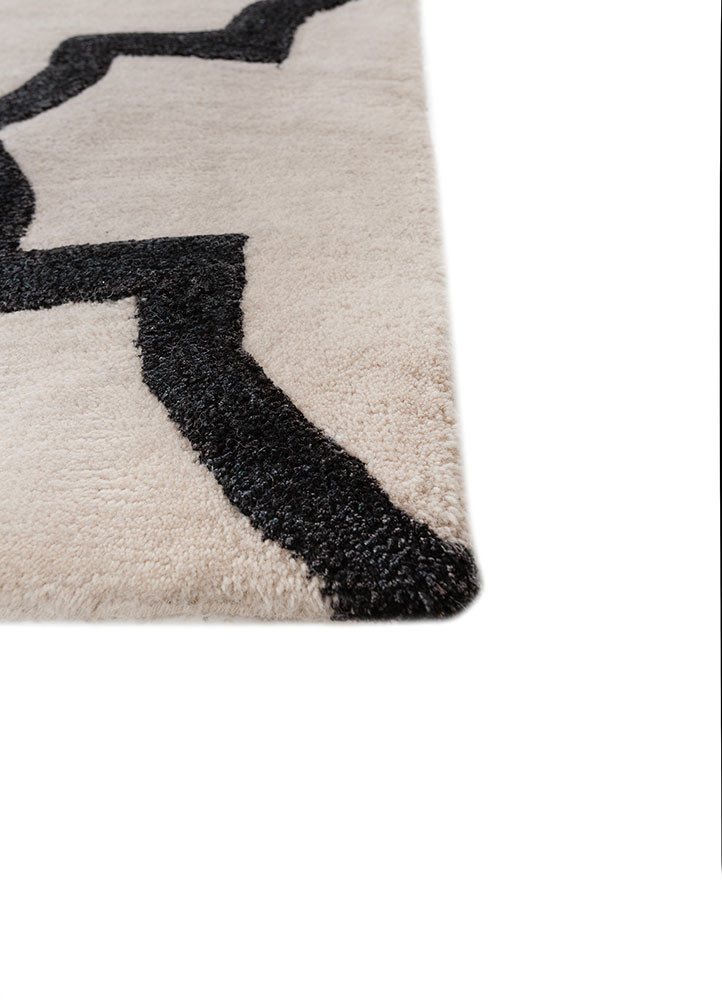 contour ivory wool and viscose hand tufted Rug - Corner