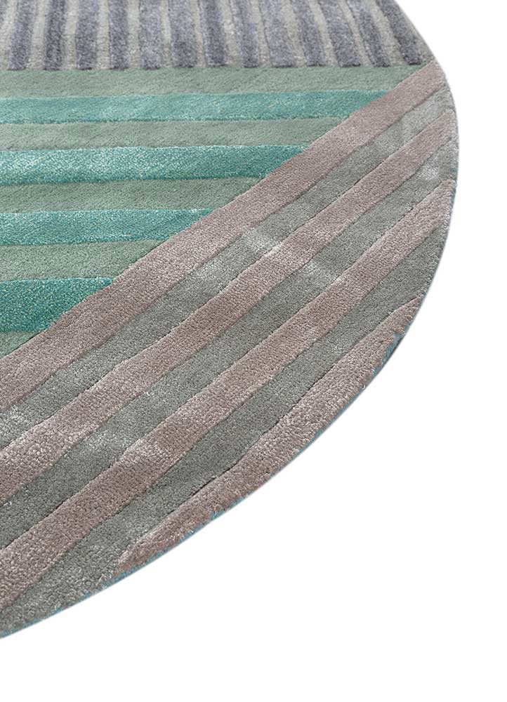 come around blue wool and viscose hand tufted Rug - Corner