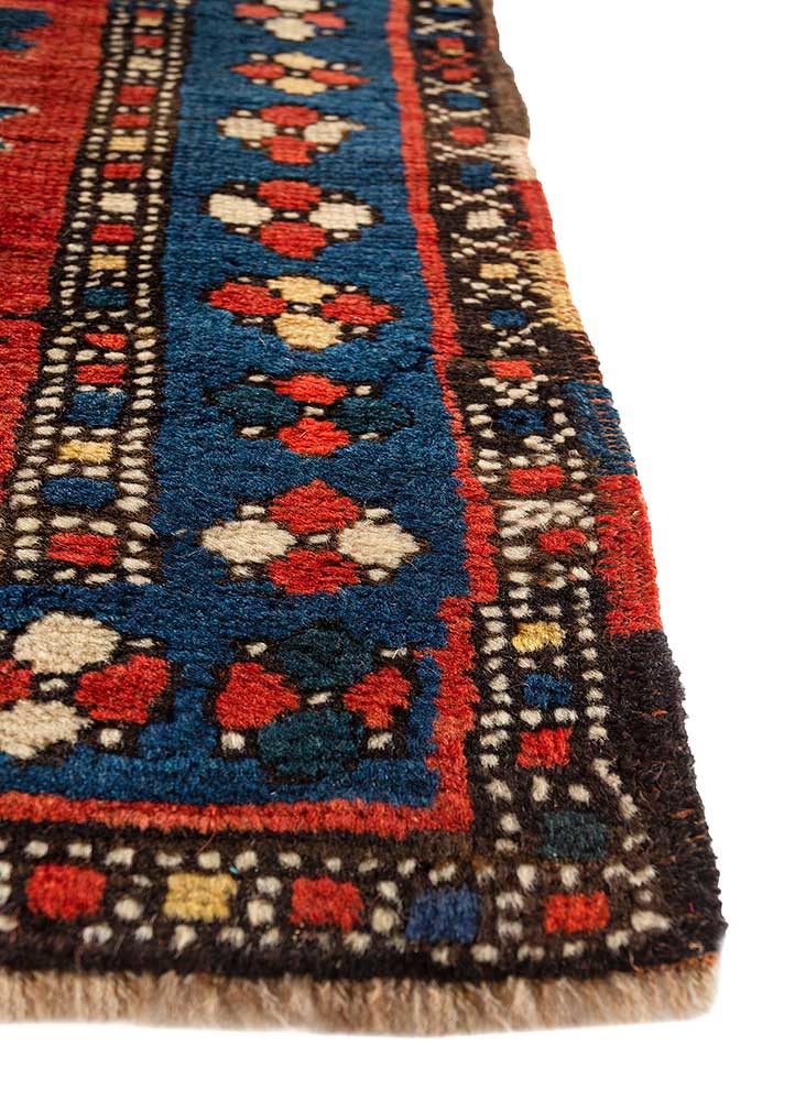 aalam red and orange wool hand knotted Rug - Corner