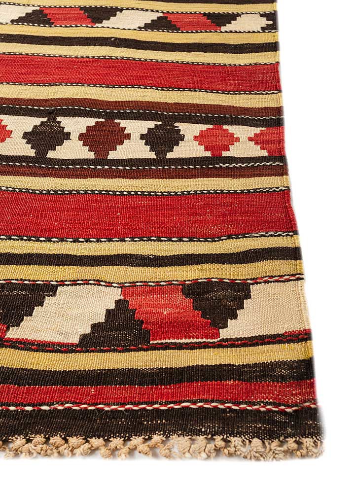 nayaab red and orange wool flat weaves Rug - Corner