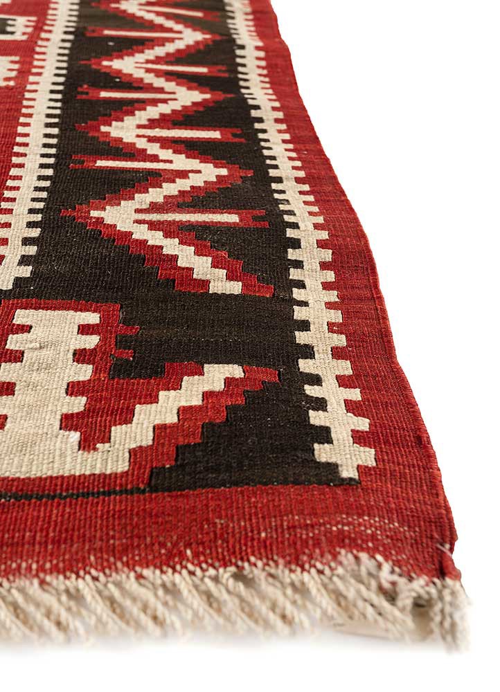 nayaab red and orange wool flat weaves Rug - Corner