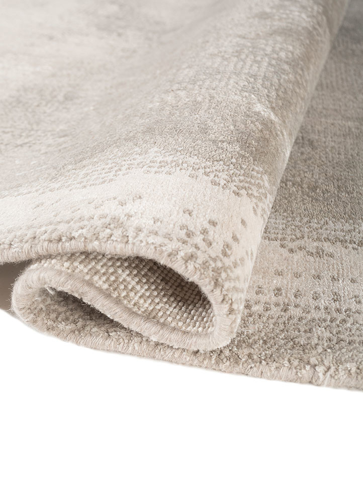 aprezo ivory wool and bamboo silk hand knotted Rug - FoldShot