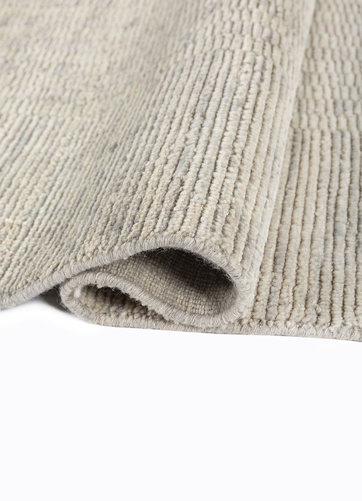 saga ivory wool hand loom Rug - FoldShot saga ivory wool hand loom Rug - FoldShot