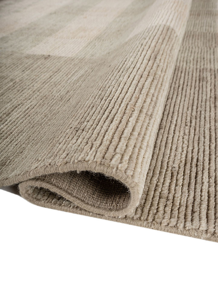 saga green wool hand loom Rug - FoldShot saga green wool hand loom Rug - FoldShot