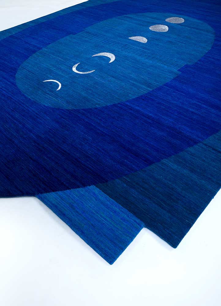 brahmaand blue wool hand knotted Rug - FoldShot brahmaand blue wool hand knotted Rug - FoldShot