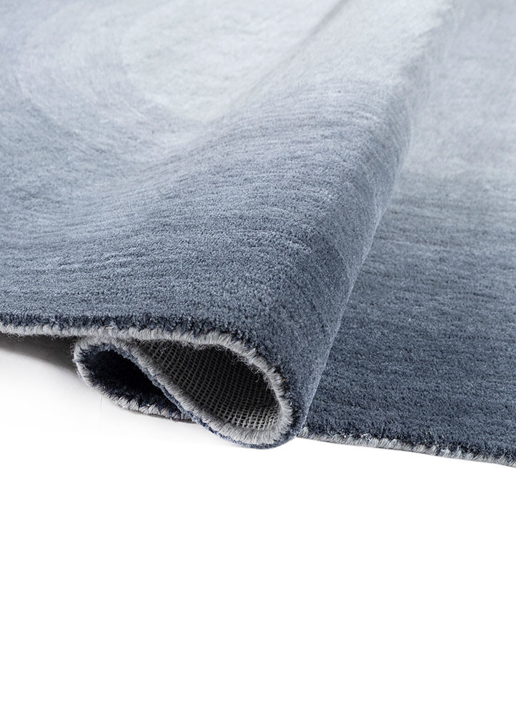 chroma blue wool hand tufted Rug - FoldShot