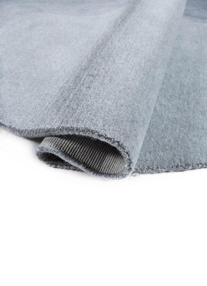 chroma blue wool hand tufted Rug - FoldShot