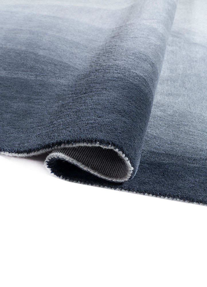 chroma blue wool hand tufted Rug - FoldShot