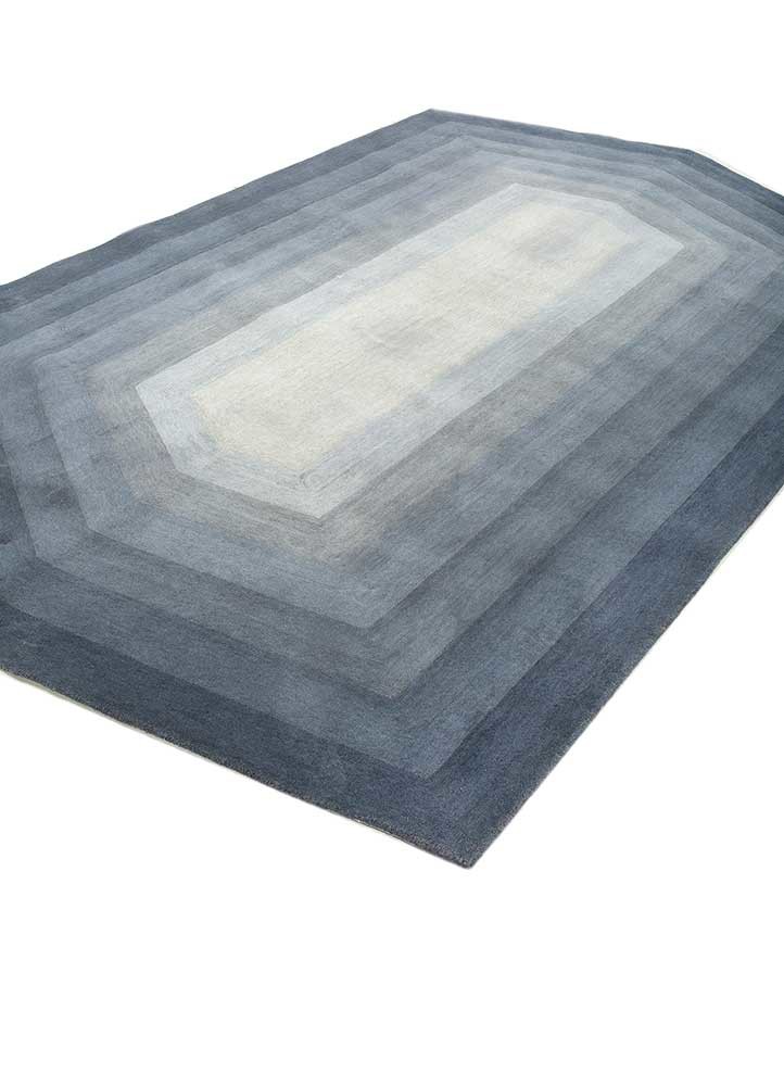 chroma blue wool hand tufted Rug - FoldShot