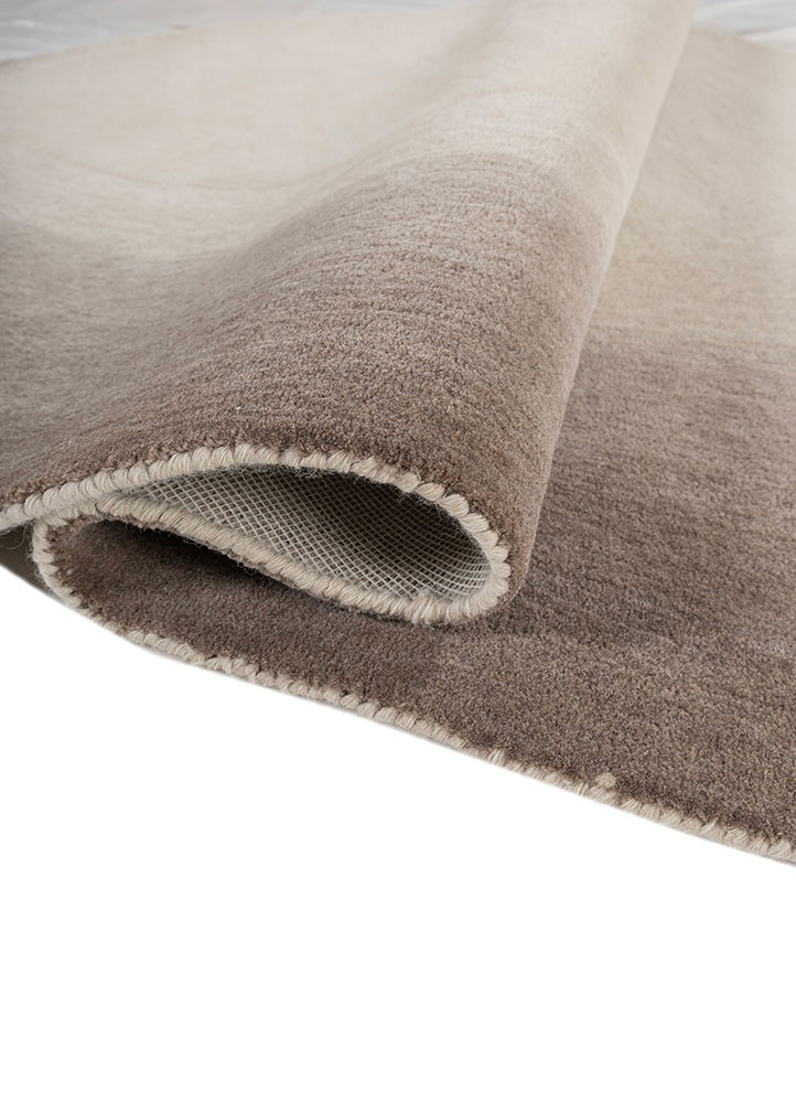 chroma ivory wool hand tufted Rug - FoldShot