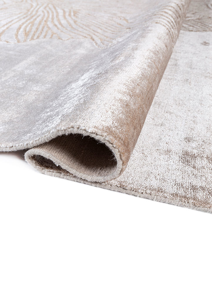 aprezo ivory bamboo silk and zari hand knotted Rug - FoldShot