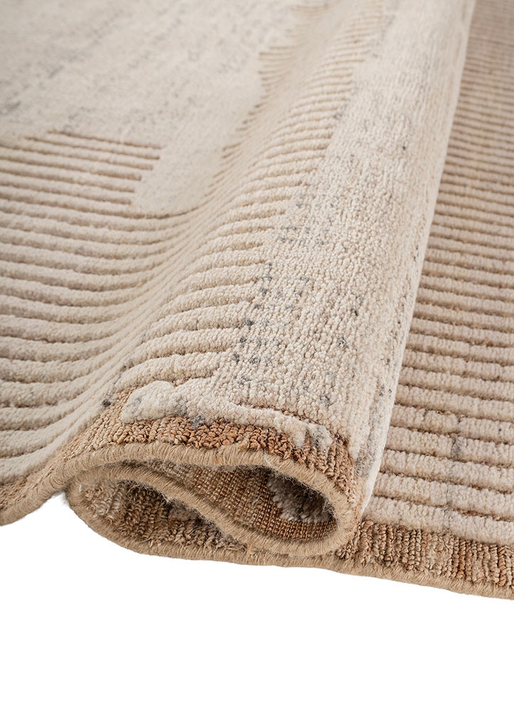 manifest ivory wool hand knotted Rug - FoldShot manifest ivory wool hand knotted Rug - FoldShot