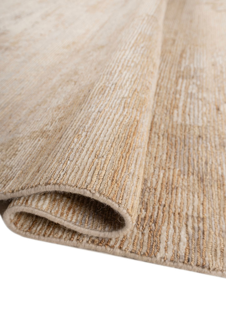 aprezo beige and brown wool hand knotted Rug - FoldShot aprezo beige and brown wool hand knotted Rug - FoldShot