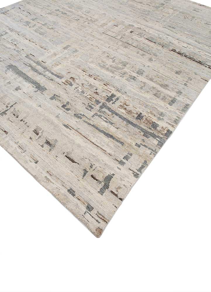 manifest blue afghan wool hand knotted Rug - FoldShot manifest blue afghan wool hand knotted Rug - FoldShot