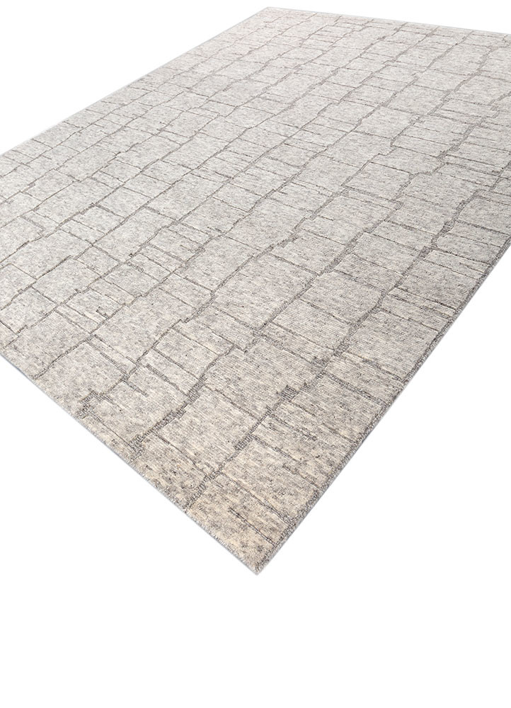 manifest ivory wool hand knotted Rug - FoldShot manifest ivory wool hand knotted Rug - FoldShot