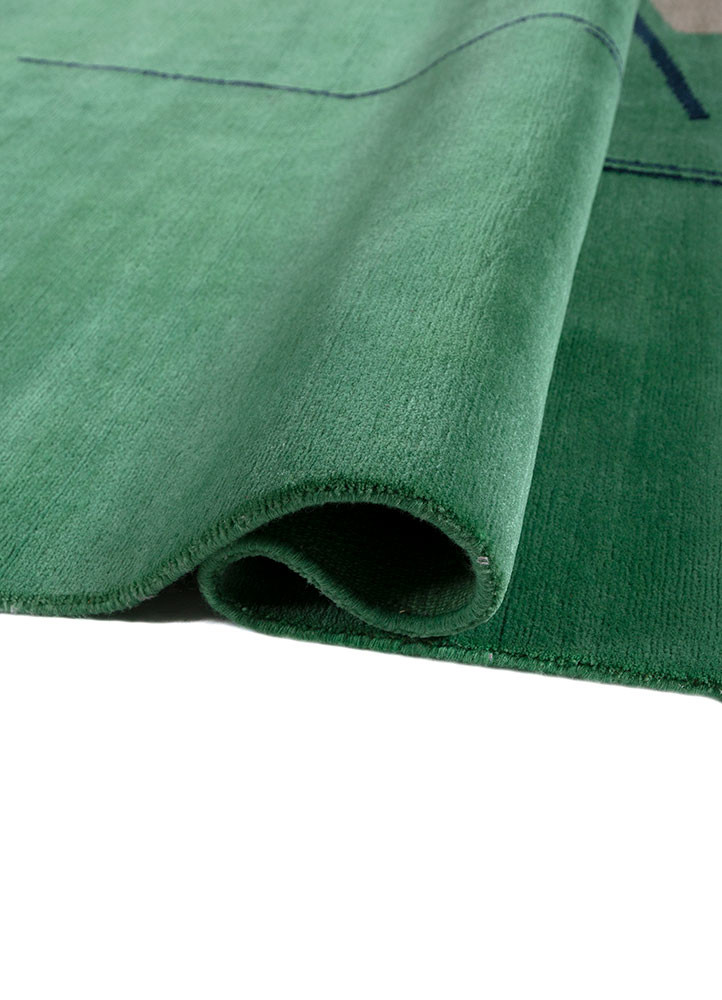 sthir green wool hand knotted Rug - FoldShot sthir green wool hand knotted Rug - FoldShot