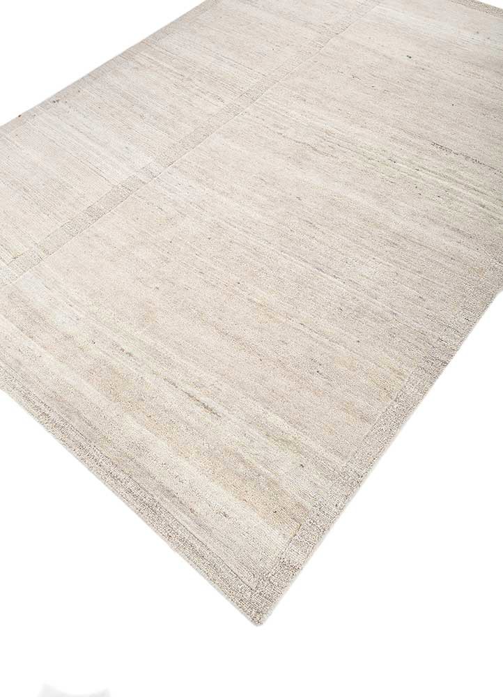 manifest ivory wool hand knotted Rug - FoldShot manifest ivory wool hand knotted Rug - FoldShot