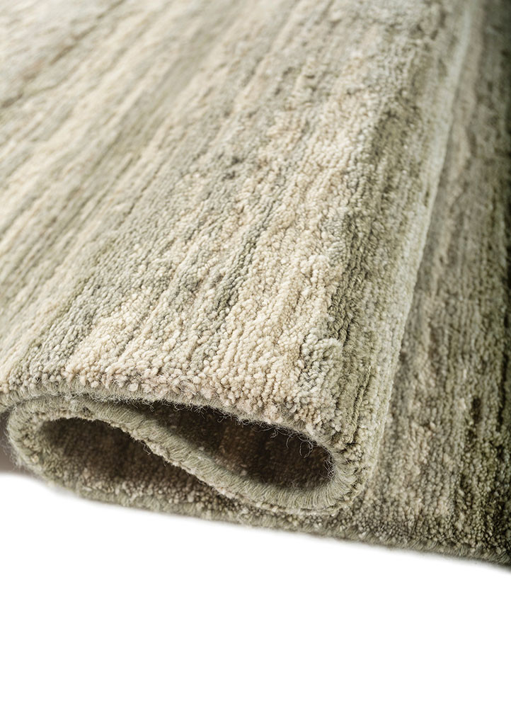 uvenuti green wool hand knotted Rug - FoldShot uvenuti green wool hand knotted Rug - FoldShot