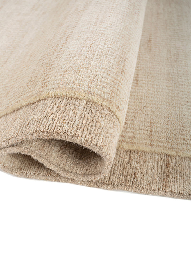 aprezo ivory wool hand knotted Rug - FoldShot aprezo ivory wool hand knotted Rug - FoldShot