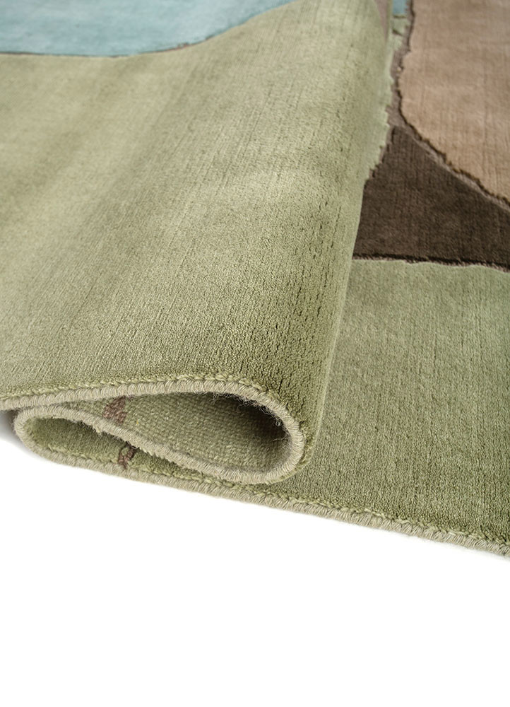 aprezo green wool hand knotted Rug - FoldShot aprezo green wool hand knotted Rug - FoldShot