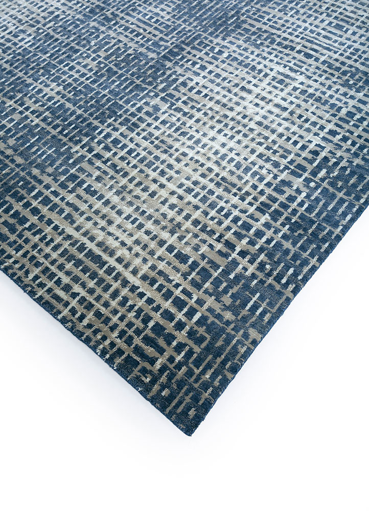 uvenuti blue wool and silk hand knotted Rug - FoldShot