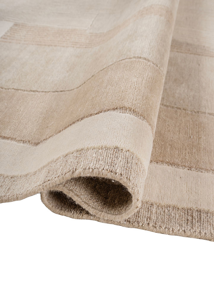 aprezo ivory wool and silk hand knotted Rug - FoldShot