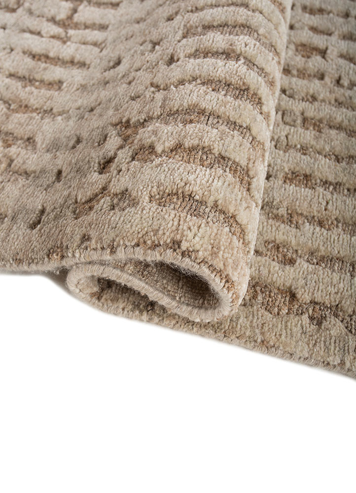 uvenuti ivory wool hand knotted Rug - FoldShot