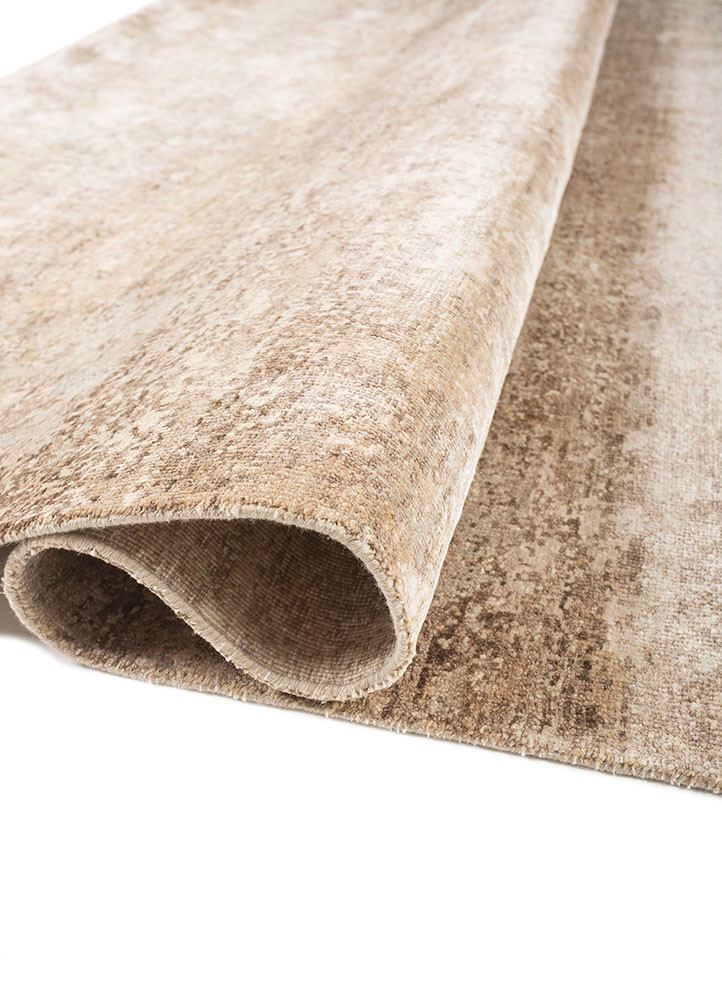 gulmarg ivory silk hand knotted Rug - FoldShot gulmarg ivory silk hand knotted Rug - FoldShot