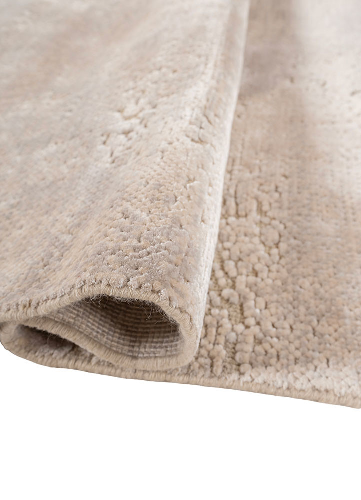 aprezo ivory wool and bamboo silk hand knotted Rug - FoldShot