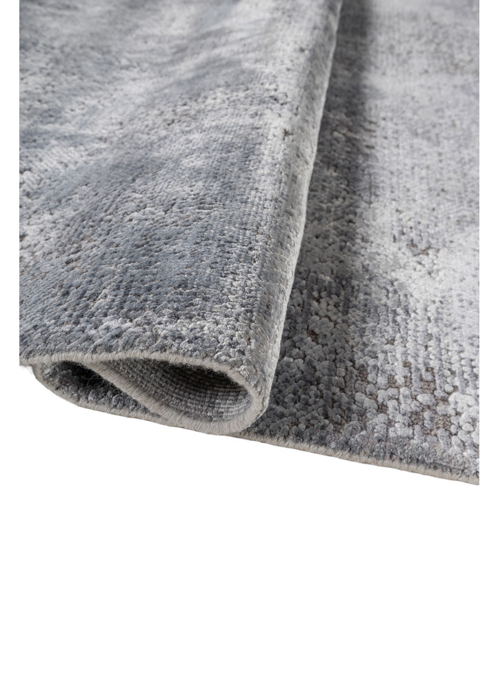 uvenuti blue wool and bamboo silk hand knotted Rug - FoldShot uvenuti blue wool and bamboo silk hand knotted Rug - FoldShot